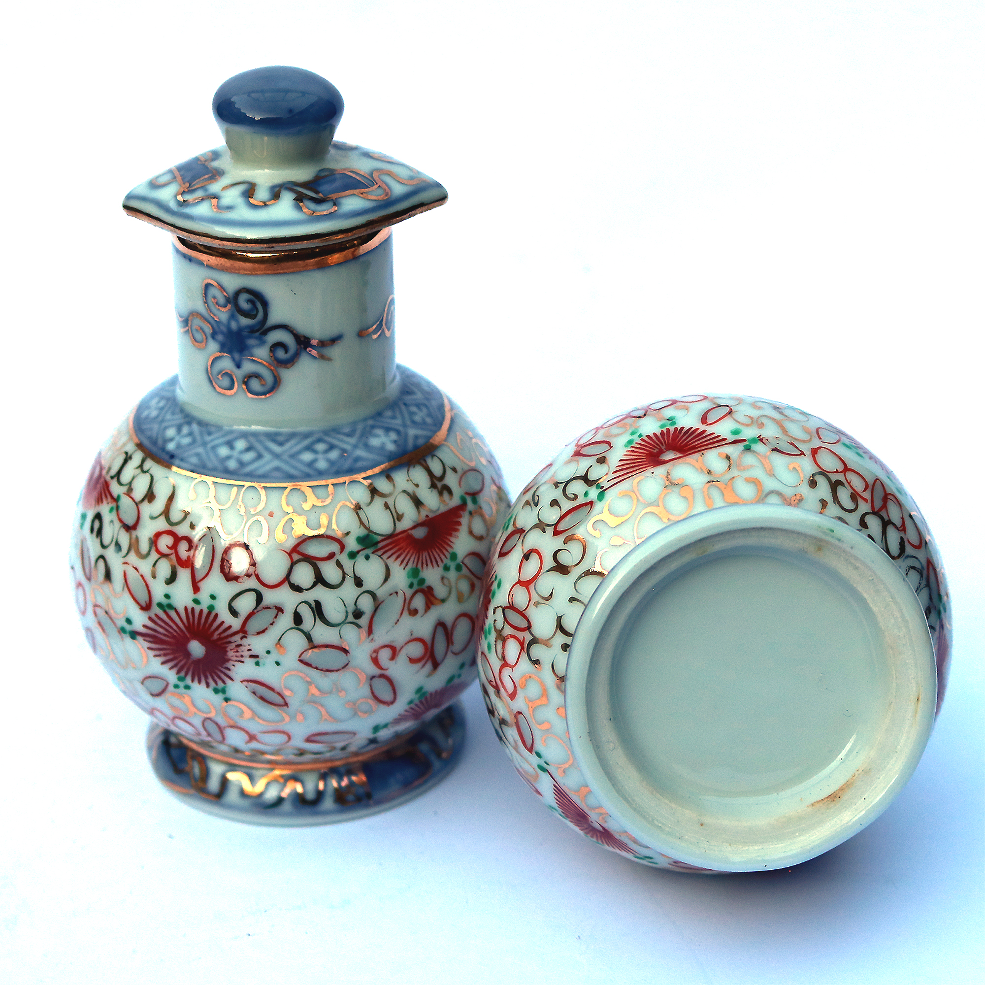 An unusual pair of porcelain Scent Perfume Bottle with screw caps C.20thC