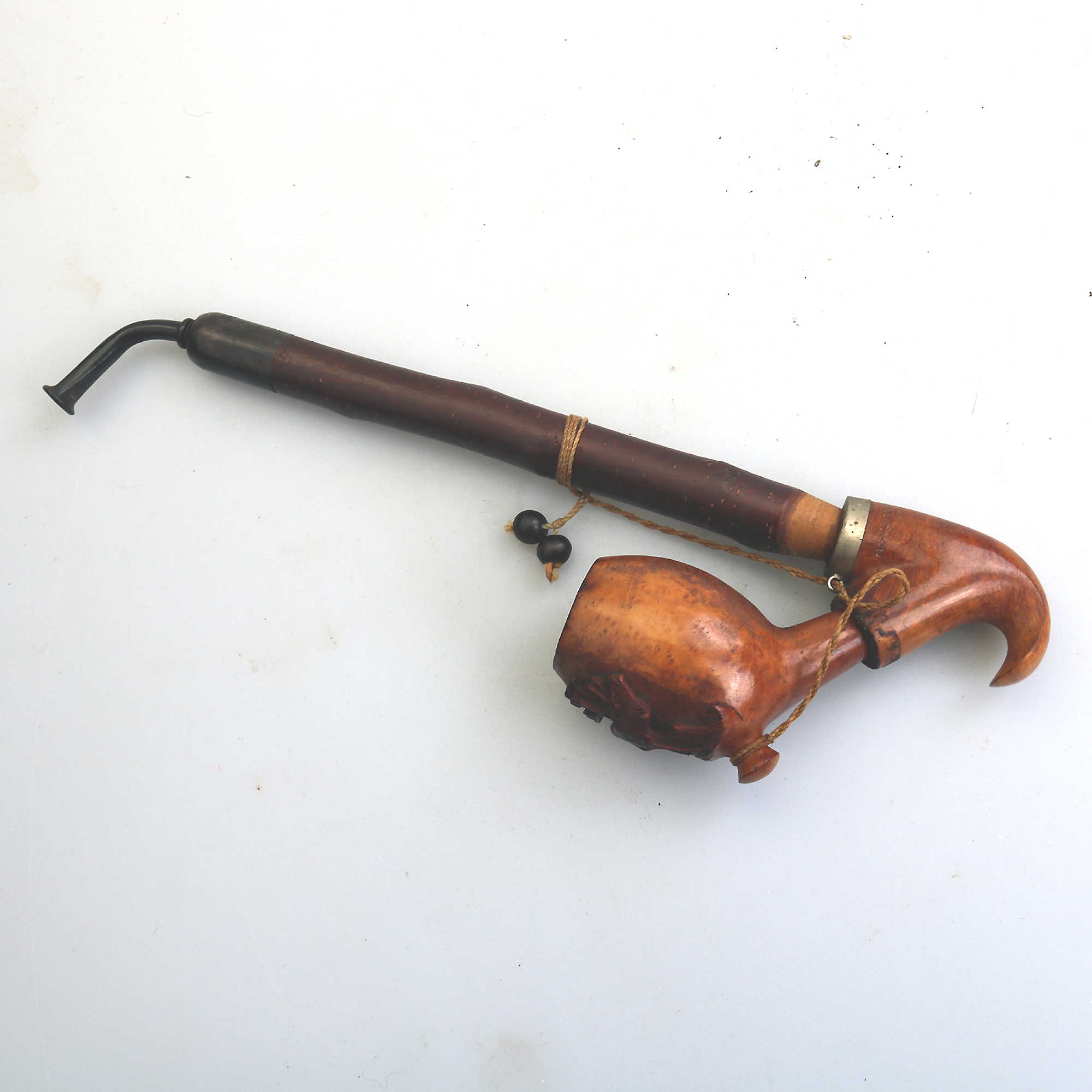 An antique Bavarian Black Forest carved Smokers Pipe C. late 19th/early 20thC