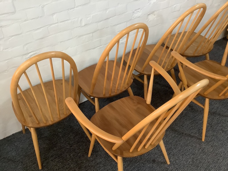 Set Of Six Ercol Windsor Quaker Back Dining Chairs In Light Finish.