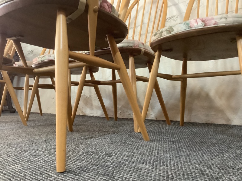 Set Of Six Ercol Windsor Quaker Back Dining Chairs In Light Finish.