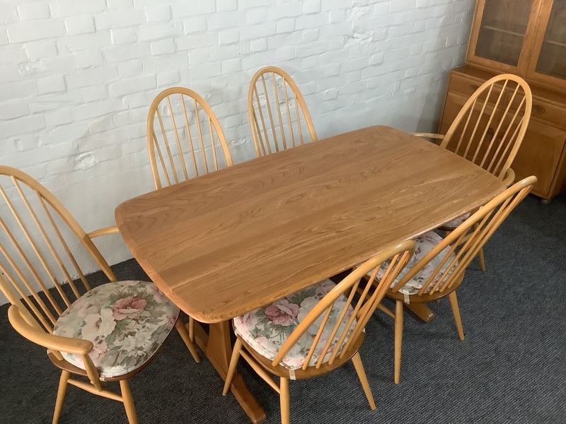 Set Of Six Ercol Windsor Quaker Back Dining Chairs In Light Finish.