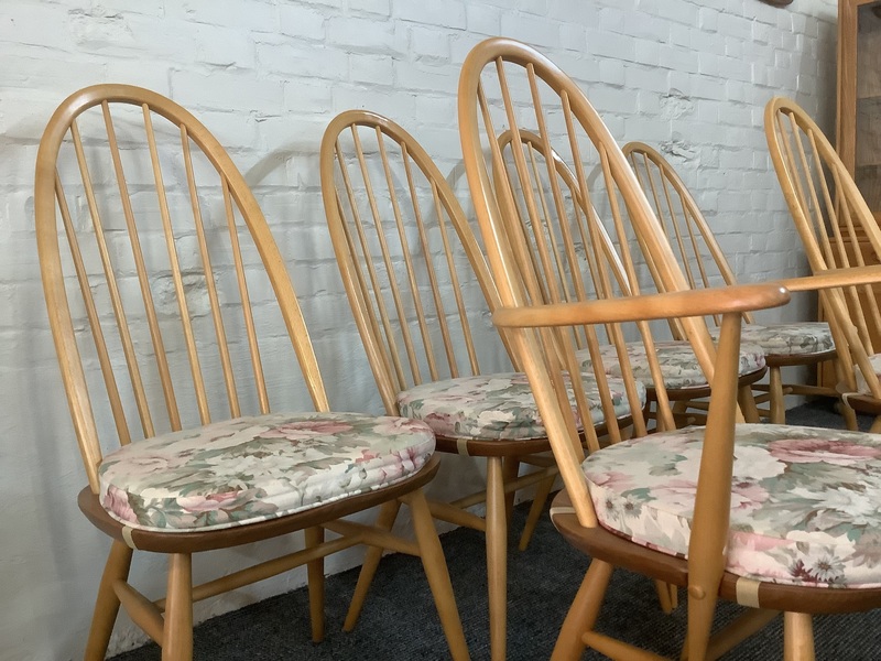 Set Of Six Ercol Windsor Quaker Back Dining Chairs In Light Finish.