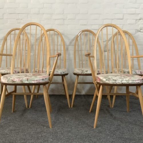 Set Of Six Ercol Windsor Quaker Back Dining Chairs In Light Finish.