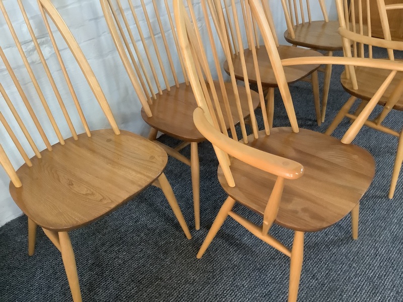 Set Of Six Ercol Windsor Quaker Back Dining Chairs In Light Finish.