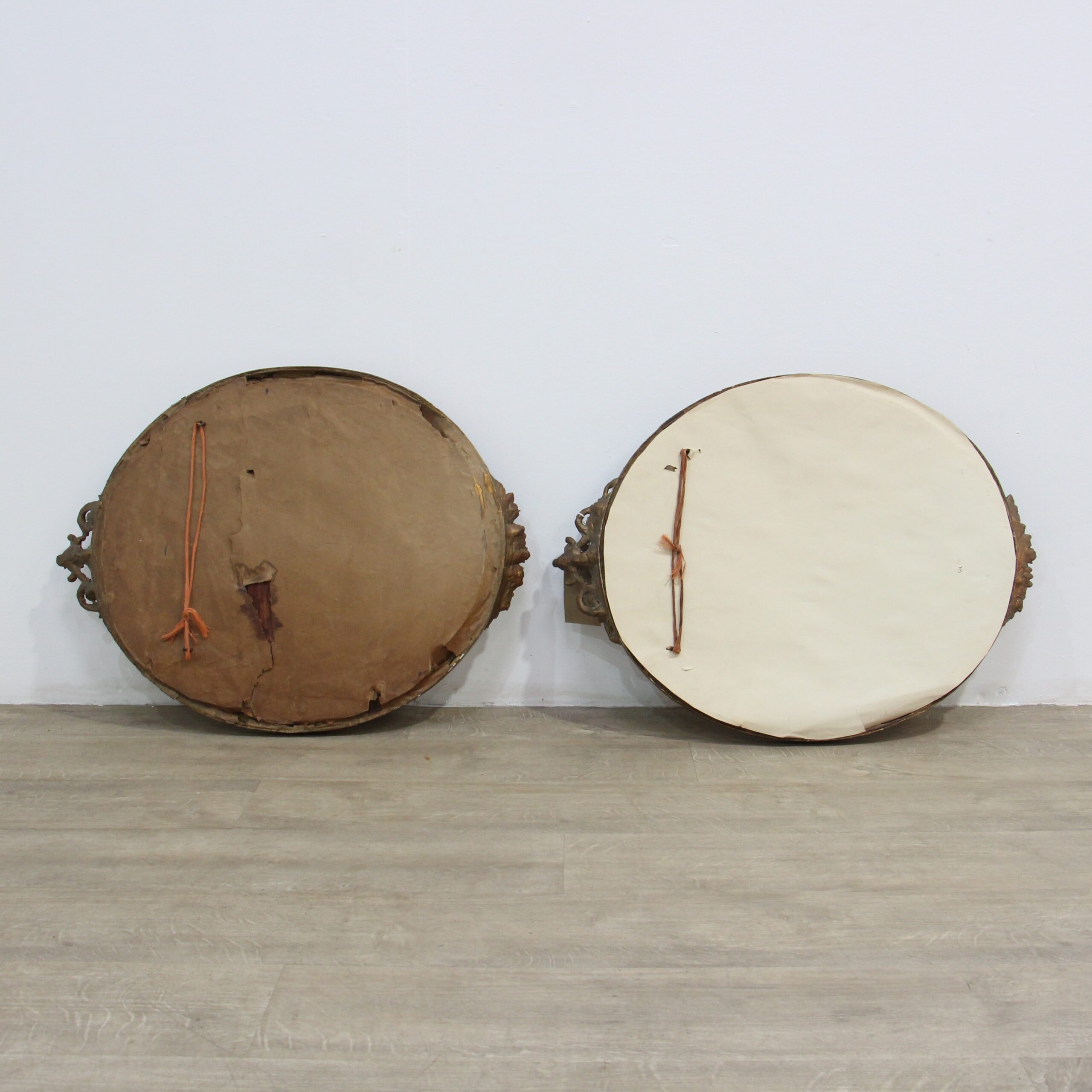 Pair of Oval Mirrors in Bronzed Ornate Wood Frames