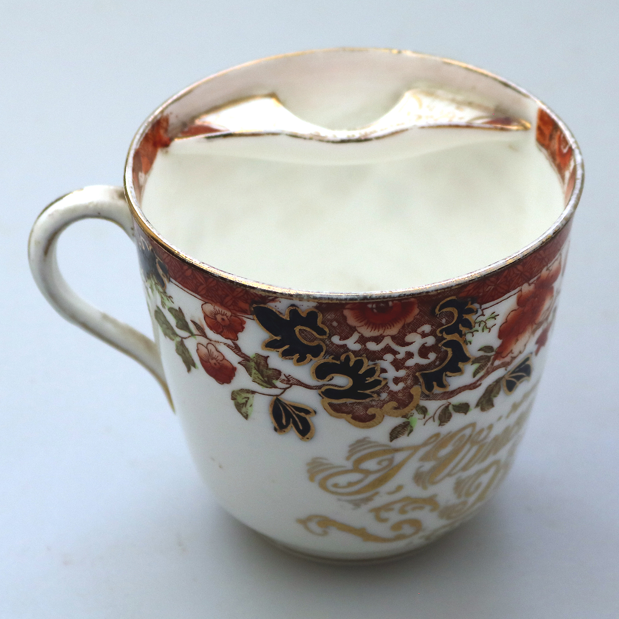 Unusual antique Staffordshire porcelain novelty Presentation Moustache Cup 1905