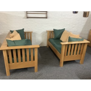 A Substantial Pair Of 3 Seater Settees In Solid English Light Oak.
