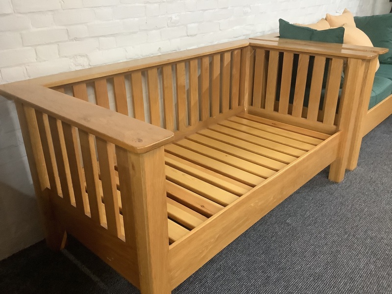 A Substantial Pair Of 3 Seater Settees In Solid English Light Oak.