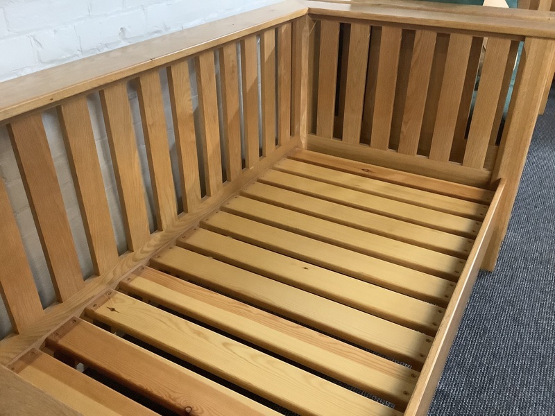 A Substantial Pair Of 3 Seater Settees In Solid English Light Oak.