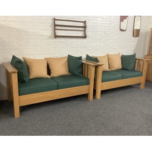 A Substantial Pair Of 3 Seater Settees In Solid English Light Oak.