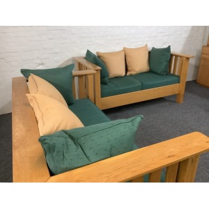 A Substantial Pair Of 3 Seater Settees In Solid English Light Oak.