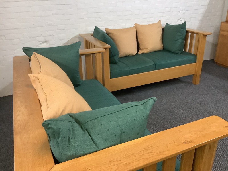 A Substantial Pair Of 3 Seater Settees In Solid English Light Oak.