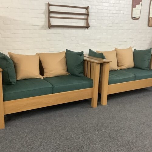 A Substantial Pair Of 3 Seater Settees In Solid English Light Oak.