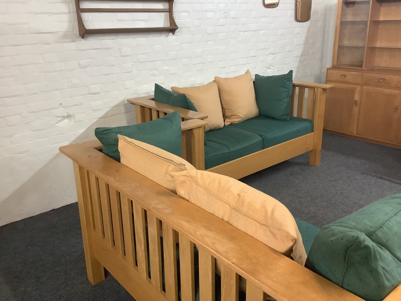 A Substantial Pair Of 3 Seater Settees In Solid English Light Oak.