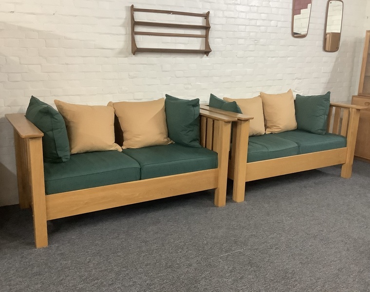 A Substantial Pair Of 3 Seater Settees In Solid English Light Oak.