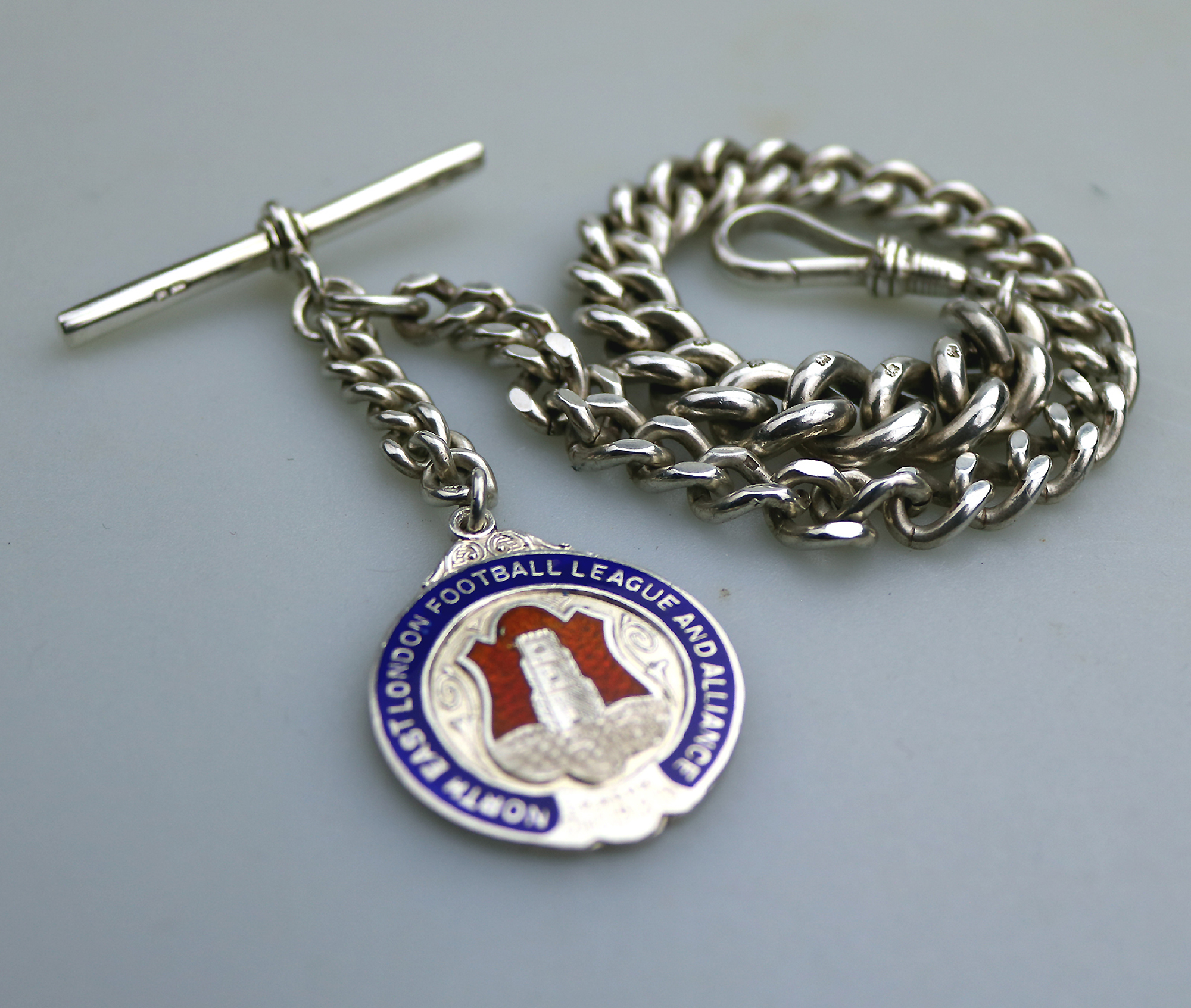A very heavy antique English solid silver Watch Albert and Football Fob 91g C.1913