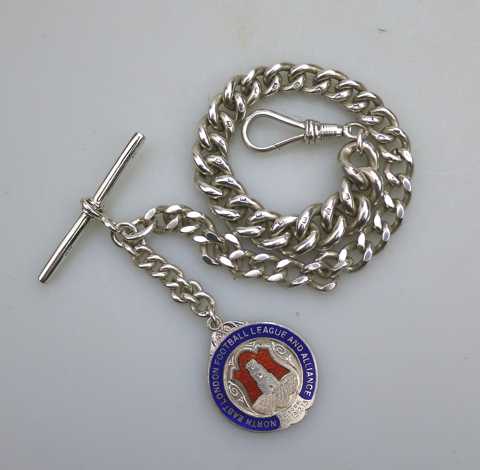 A very heavy antique English solid silver Watch Albert and Football Fob 91g C.1913