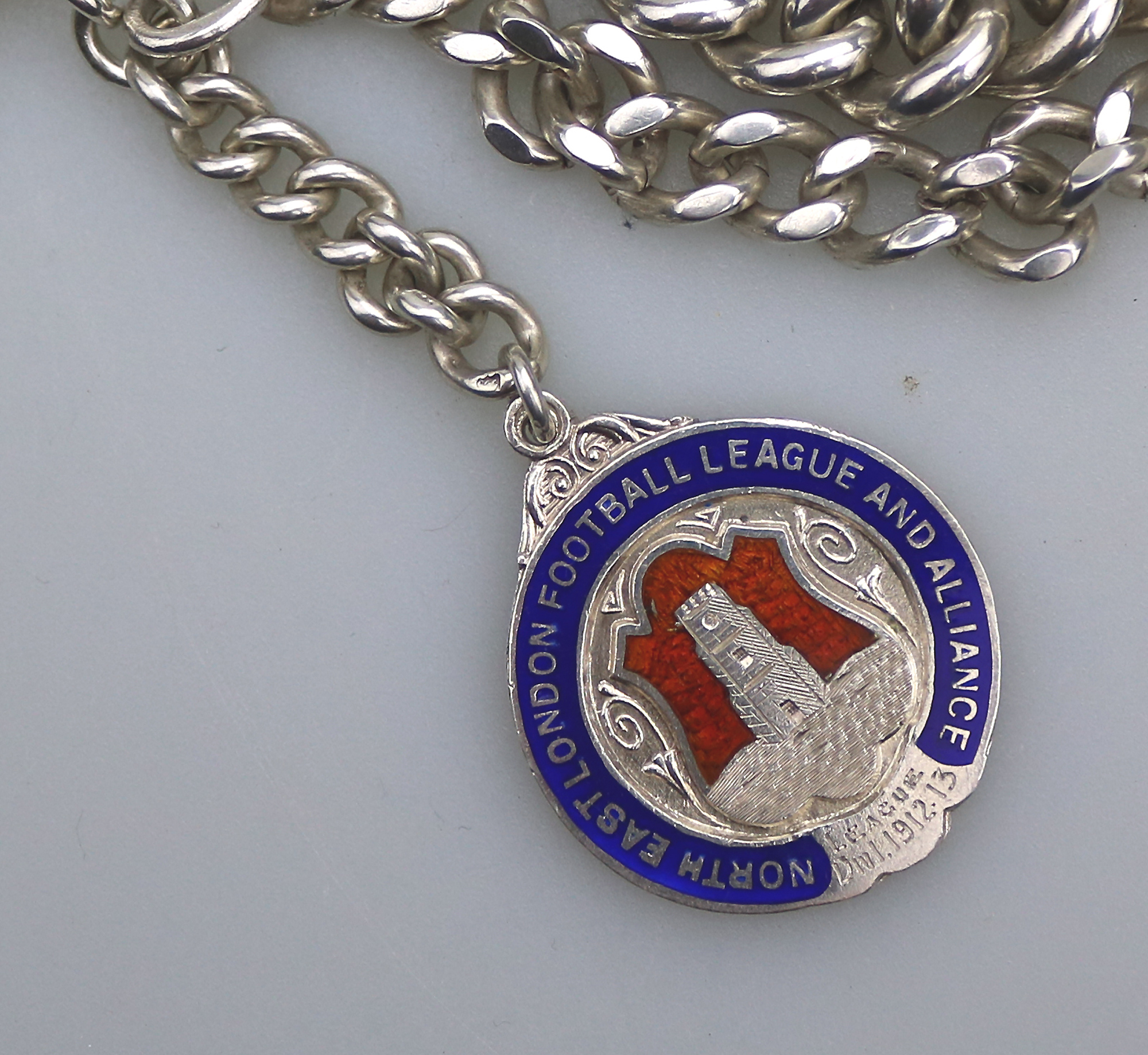 A very heavy antique English solid silver Watch Albert and Football Fob 91g C.1913