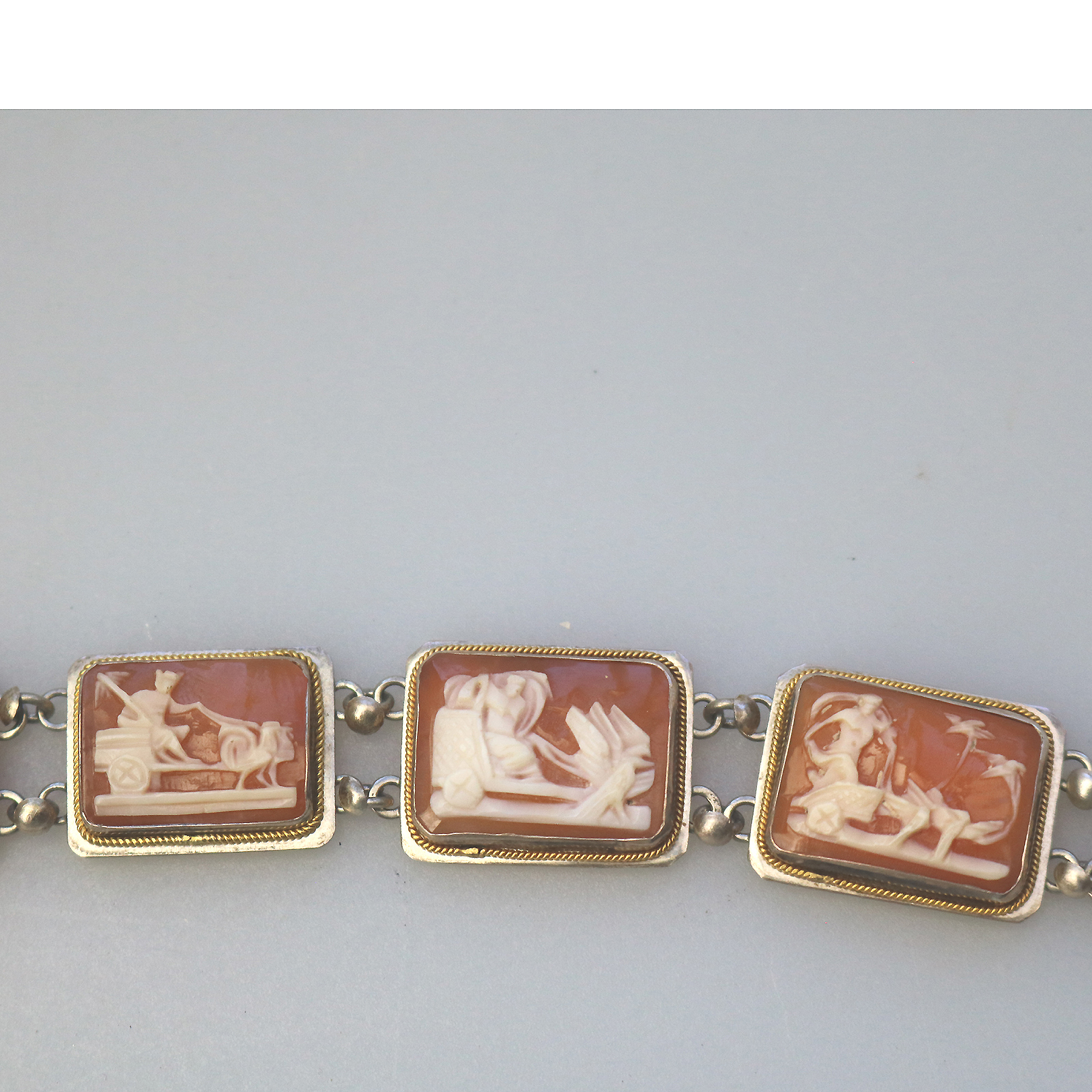 An attractive 7 panel antique 800 solid silver Cameo shell Bracelet C.1940's