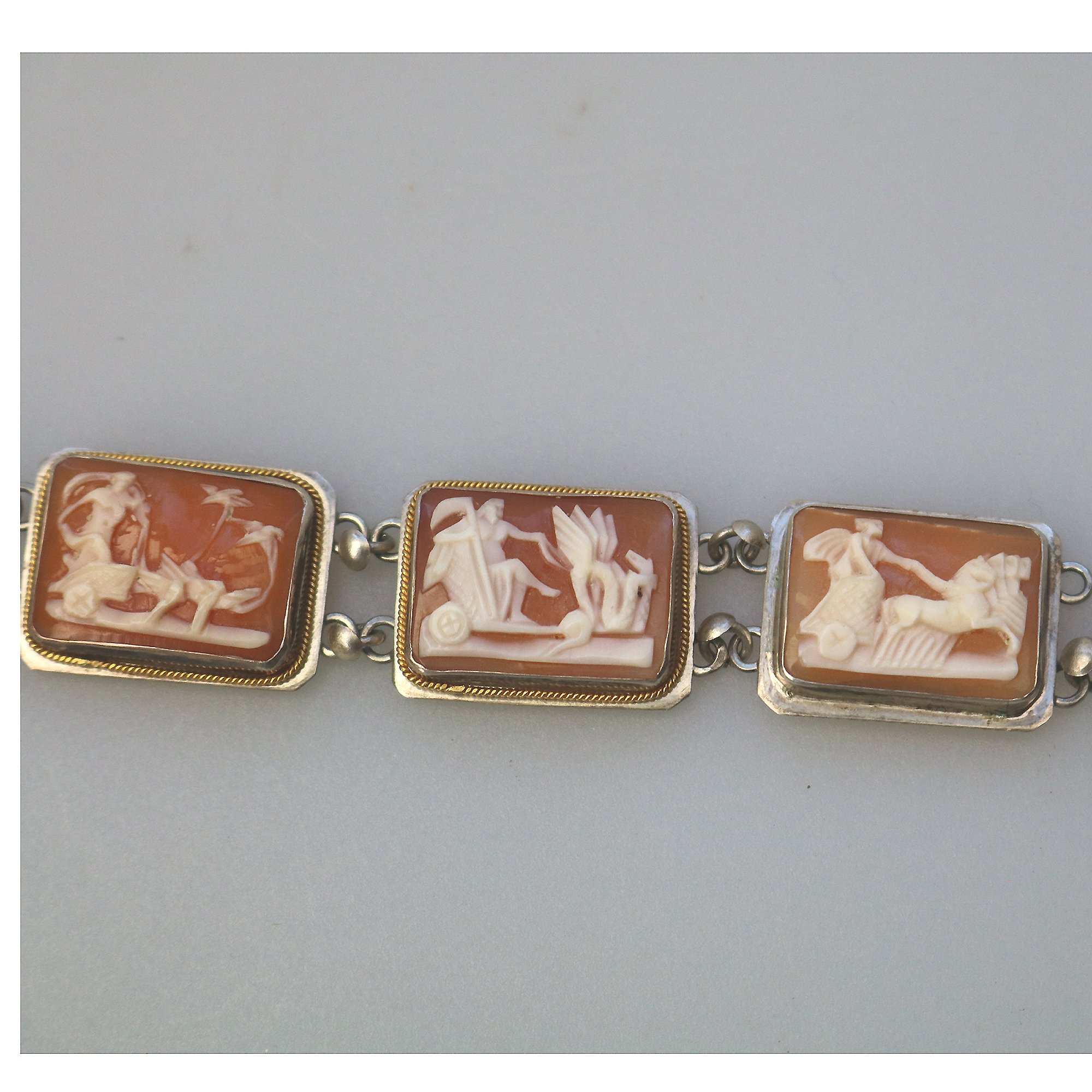 An attractive 7 panel antique 800 solid silver Cameo shell Bracelet C.1940's