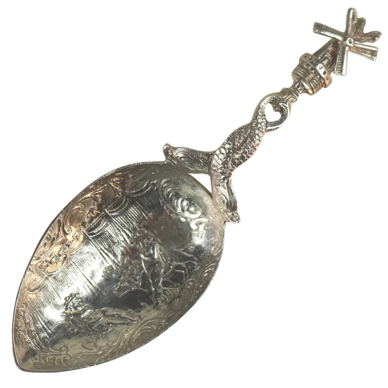 A 925 solid silver Caddy Spoon with twin dolphin and windmill stem C.early 20thC