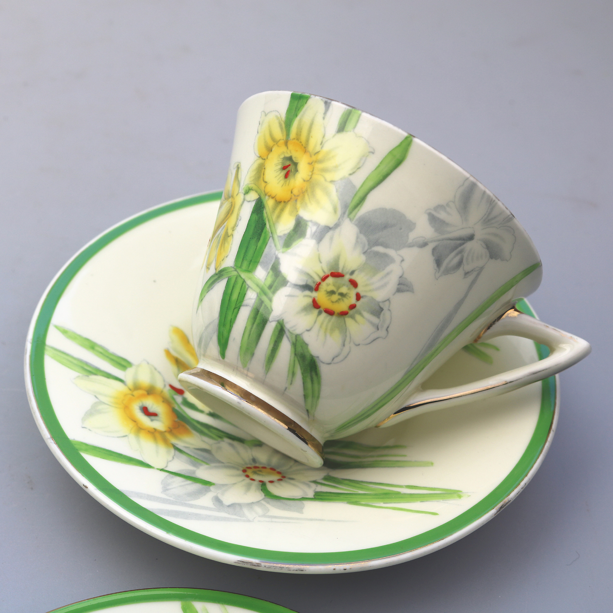 A pretty Art Deco Royal Doulton daffodil pattern porcelain Cup & Saucer C.1930's