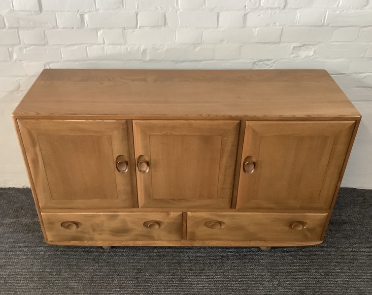 Ercol Windsor 468 Serving On Castors. Produced From Solid English Elm.