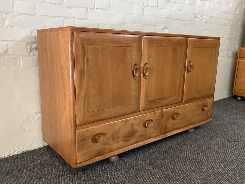 Ercol Windsor 468 Serving On Castors. Produced From Solid English Elm.