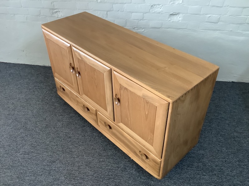 Ercol Windsor 468 Sideboard In Light Elm Finish.