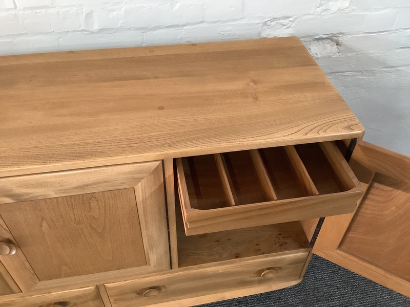 Ercol Windsor 468 Sideboard In Light Elm Finish.