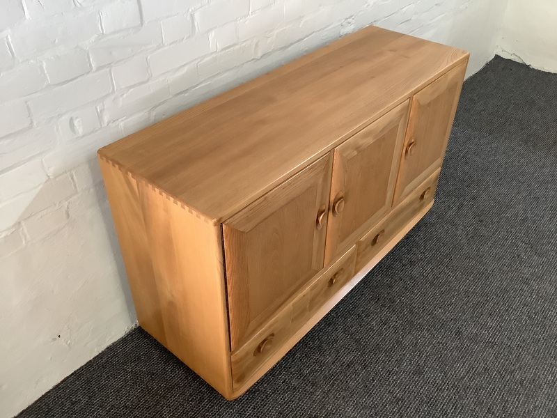 Ercol Windsor 468 Sideboard In Light Elm Finish.
