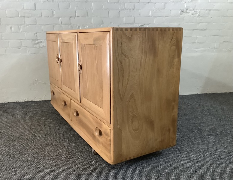 Ercol Windsor 468 Sideboard In Light Elm Finish.