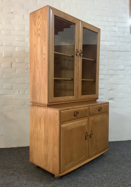 Ercol Windsor Glazed Display Cabinet In Light Elm.
