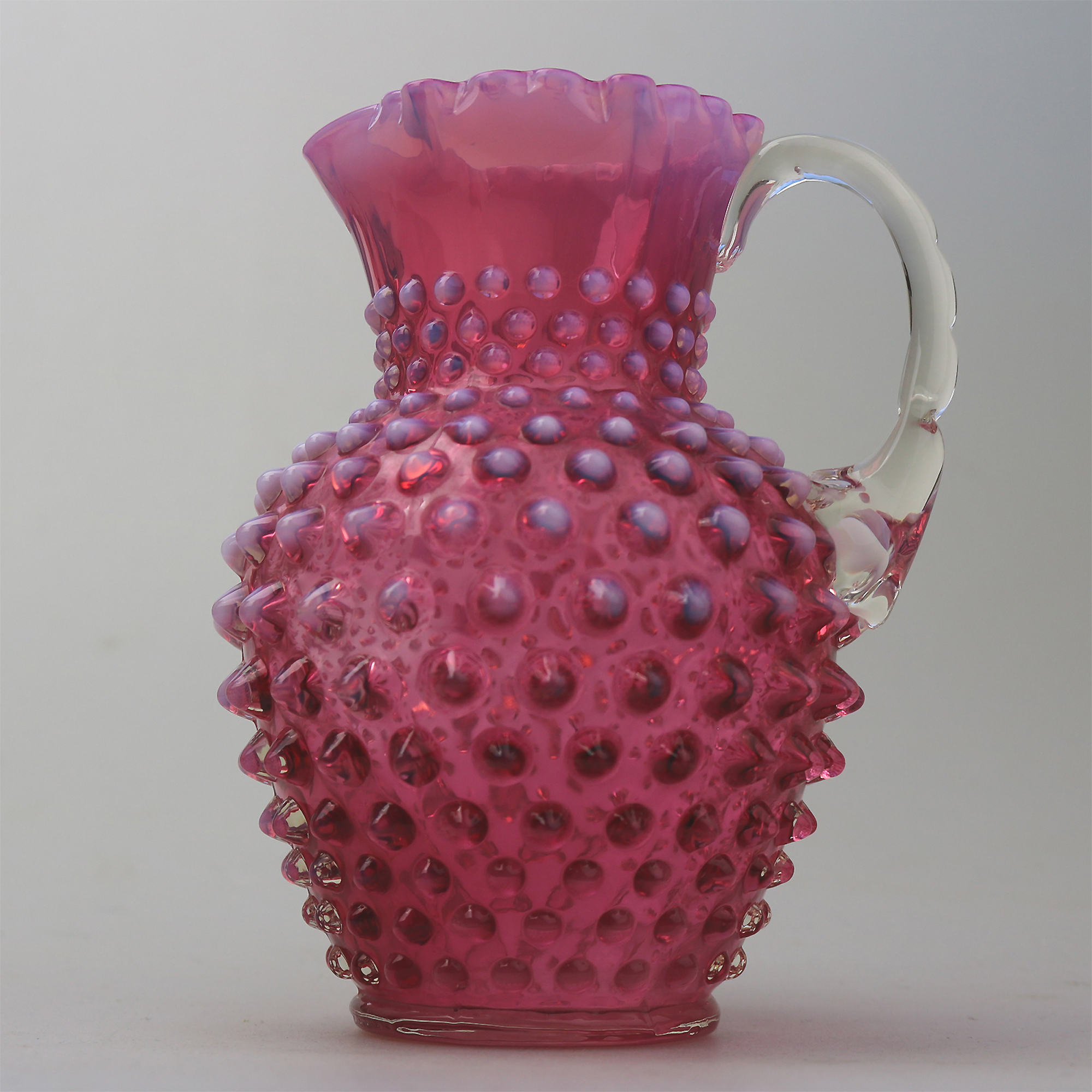 A good large novelty antique Fenton cranberry & vaseline glass Jug C.early 20thC