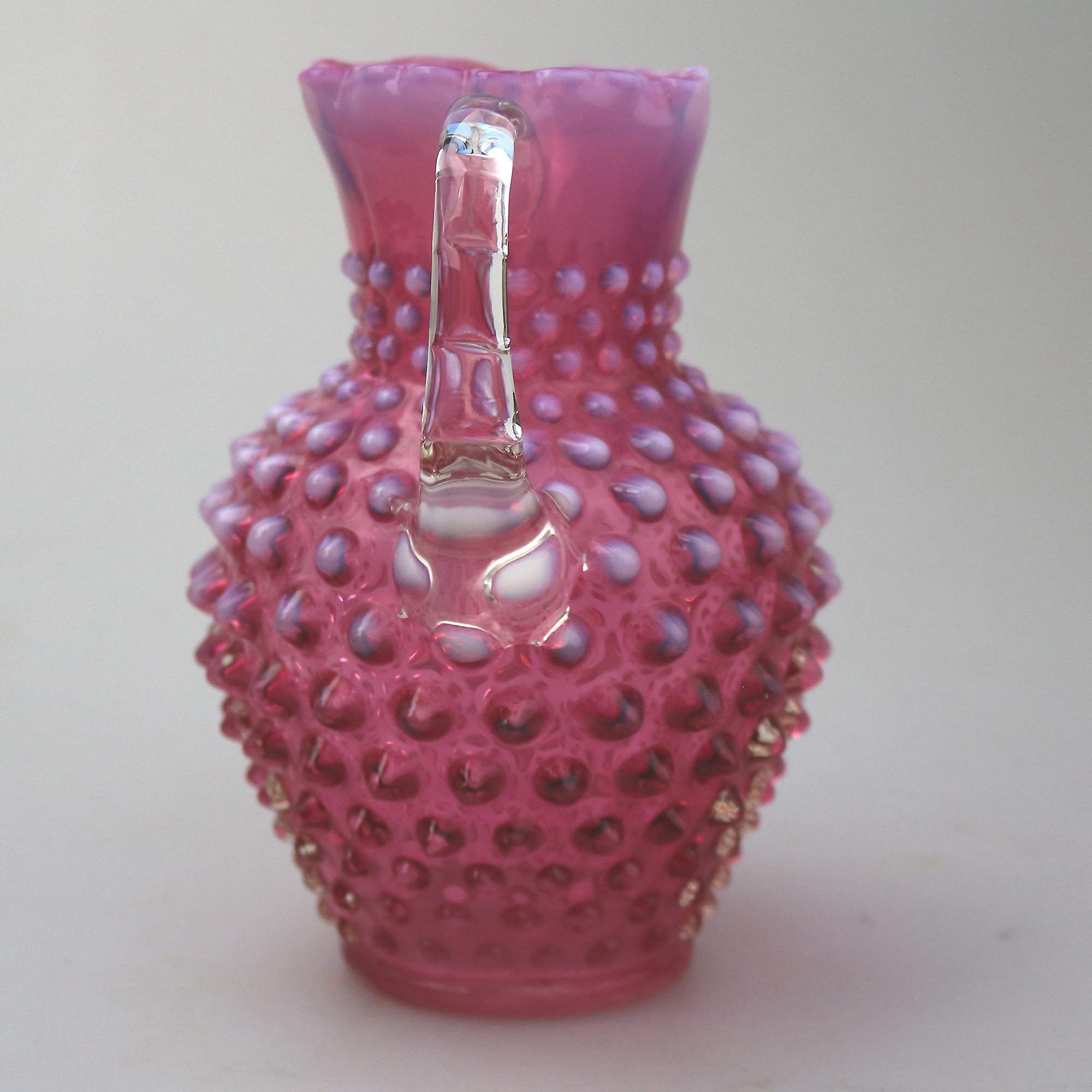 A good large novelty antique Fenton cranberry & vaseline glass Jug C.early 20thC