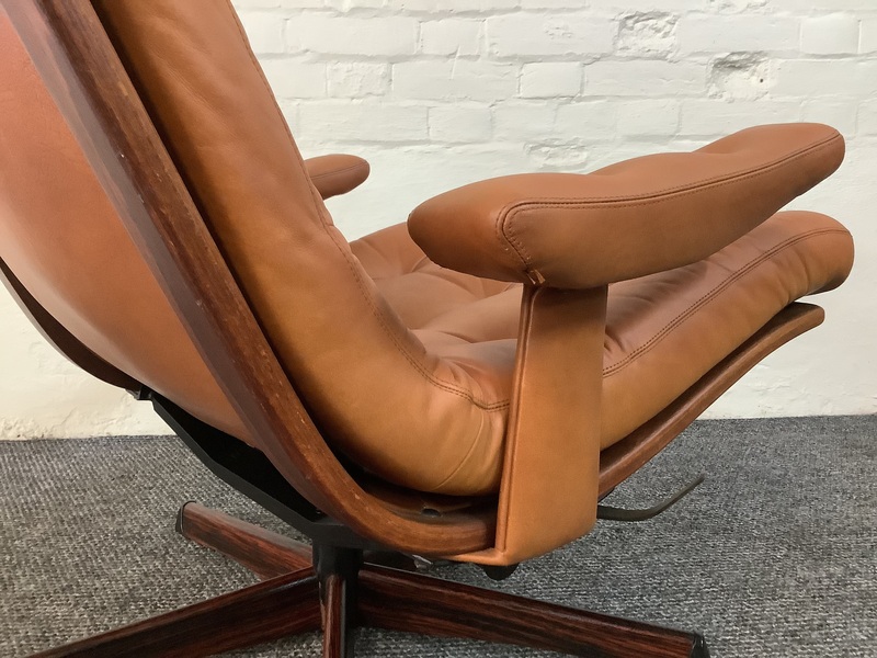 Gote Mobler Leather Reclining Swivel Chair.