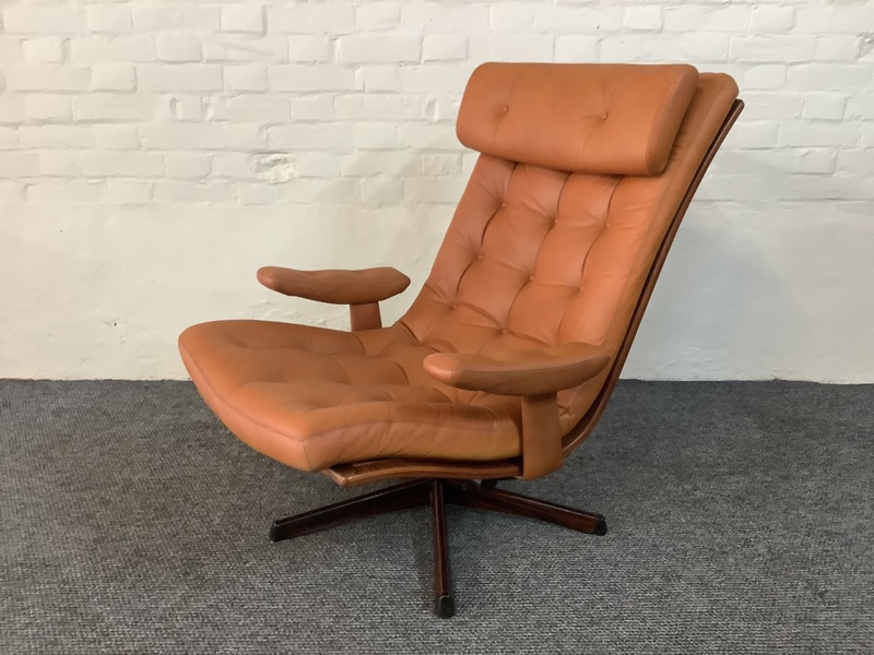 Gote Mobler Leather Reclining Swivel Chair.