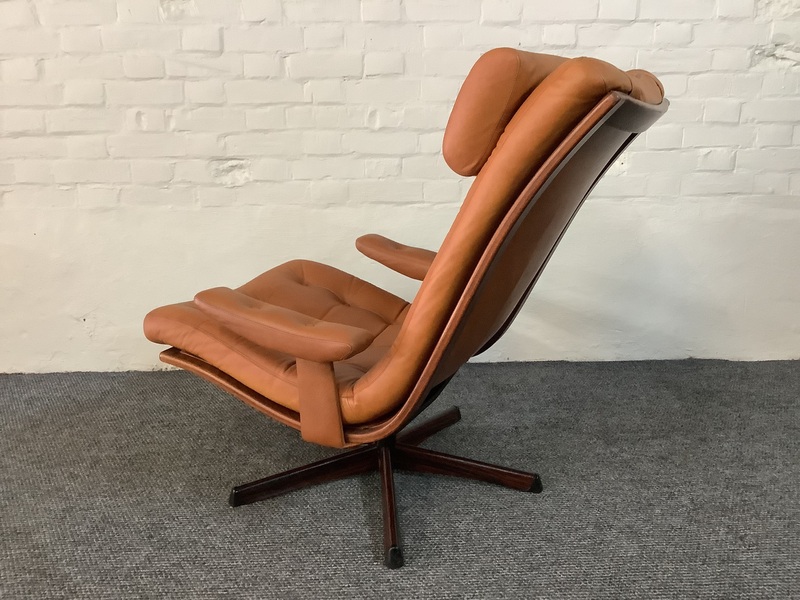 Gote Mobler Leather Reclining Swivel Chair.
