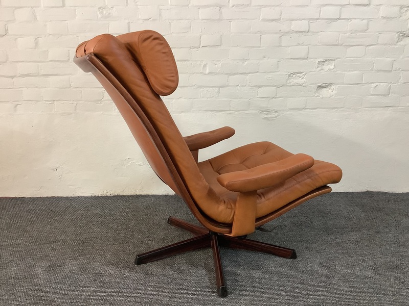 Gote Mobler Leather Reclining Swivel Chair.
