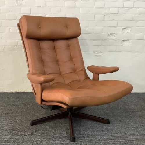 Gote Mobler Leather Reclining Swivel Chair.