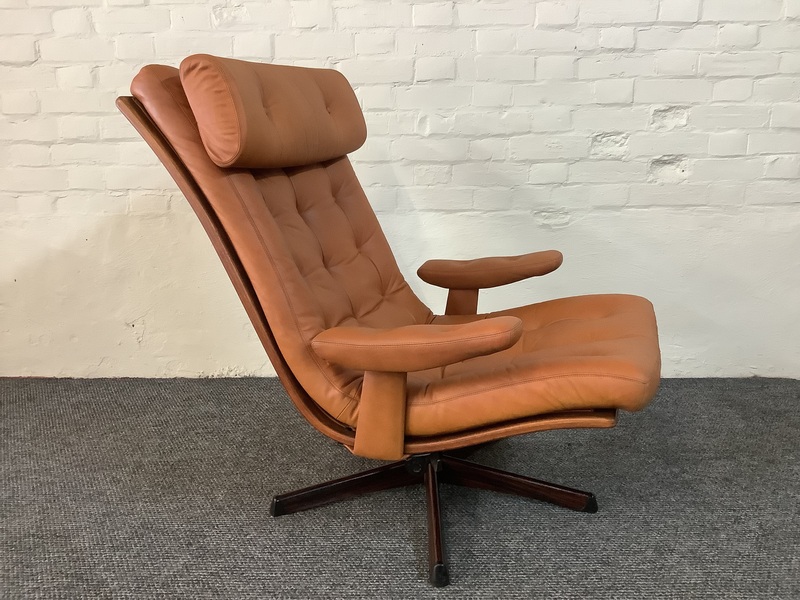 Gote Mobler Leather Reclining Swivel Chair.