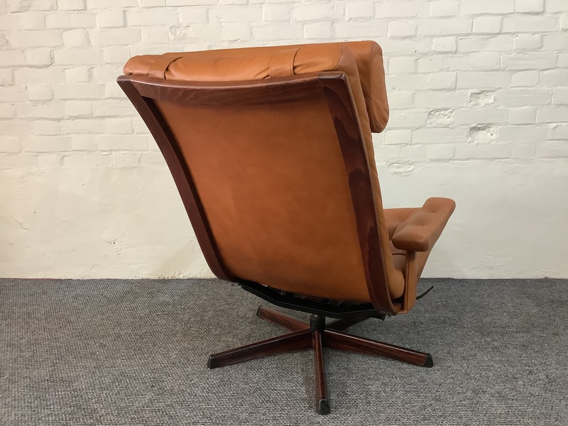 Gote Mobler Leather Reclining Swivel Chair.