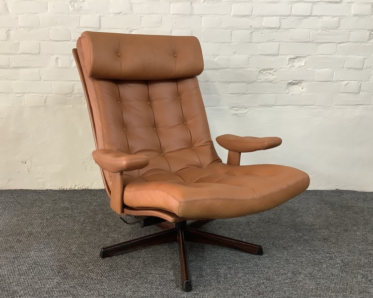 Gote Mobler Leather Reclining Swivel Chair.