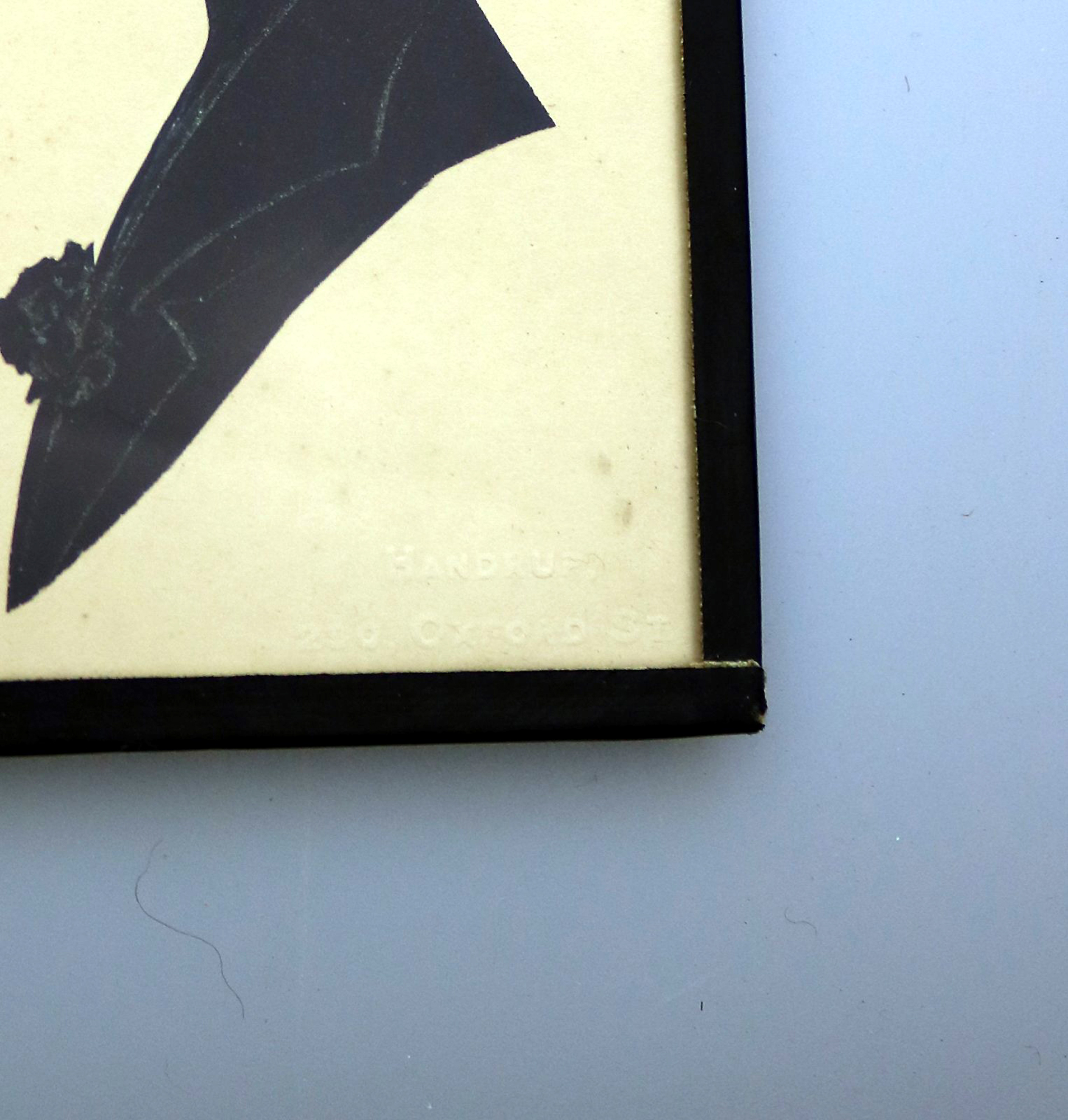 An antique Silhouette miniature picture of a lady - signed Handrup C.early 20thC
