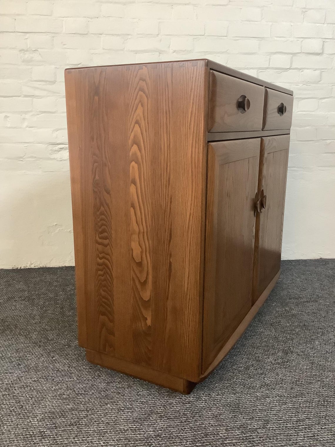 Ercol Windsor High Sideboard In Golden Dawn Finish.