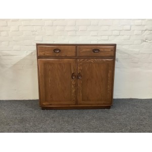 Ercol Windsor High Sideboard In Golden Dawn Finish.