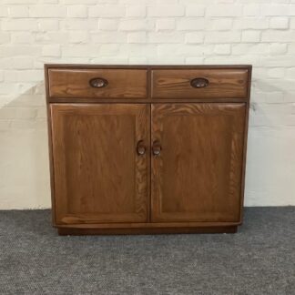 Ercol Windsor High Sideboard In Golden Dawn Finish.