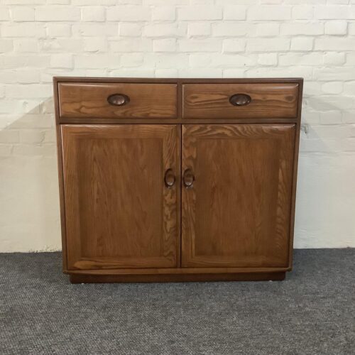 Ercol Windsor High Sideboard In Golden Dawn Finish.