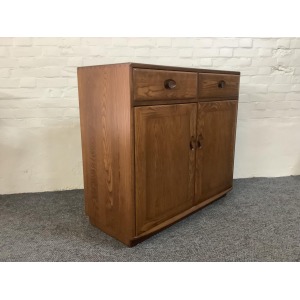 Ercol Windsor High Sideboard In Golden Dawn Finish.