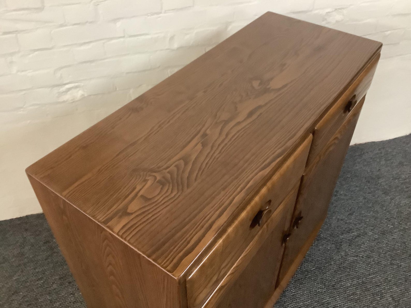 Ercol Windsor High Sideboard In Golden Dawn Finish.